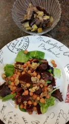 Beet, chickpea, tomatoe, and walnut salad on top of a bed of spring greens, with a side of sauteed mushrooms and leeks.